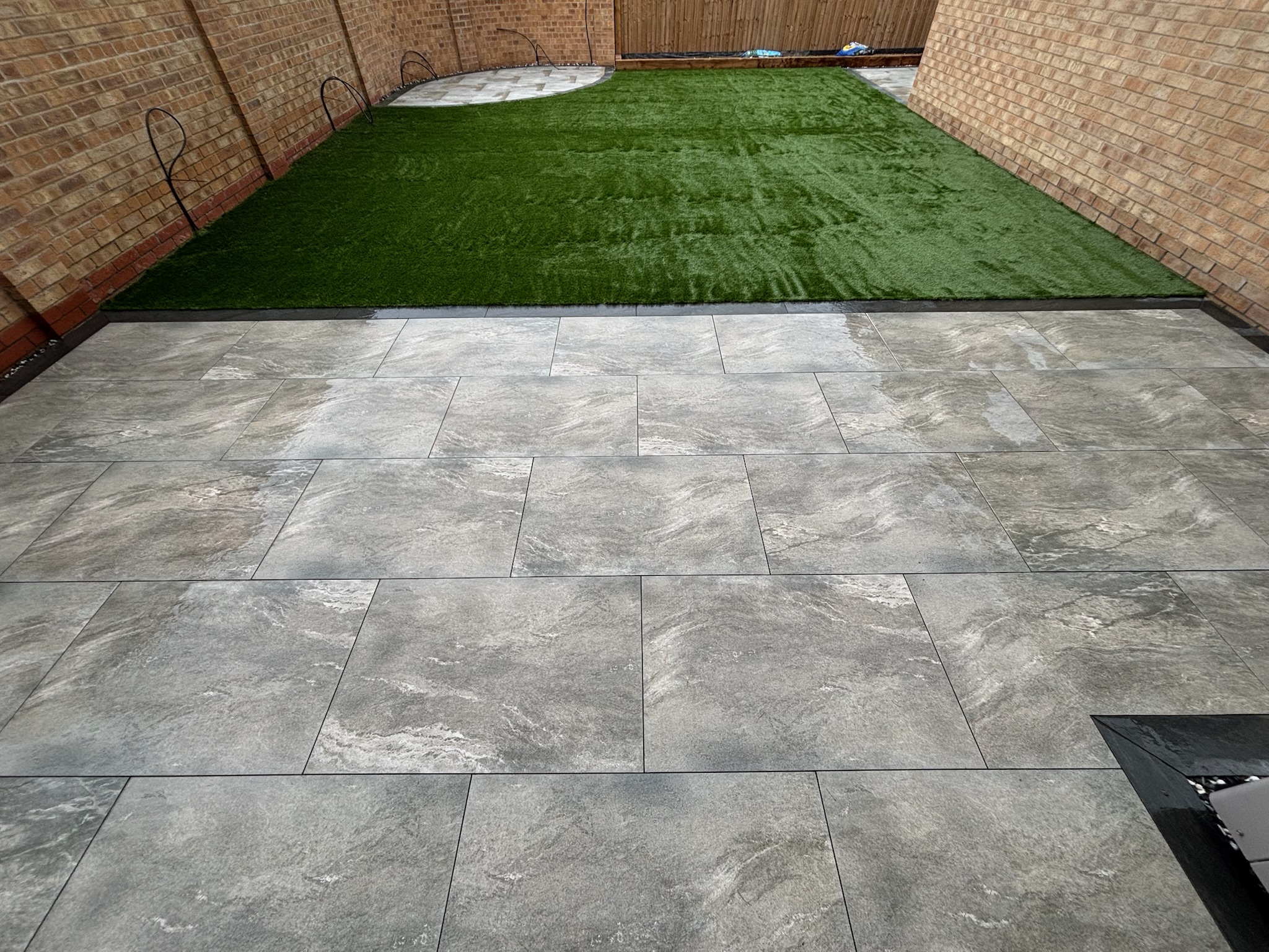 Earthcore Grey Porcelain Patios with Artificial Grass