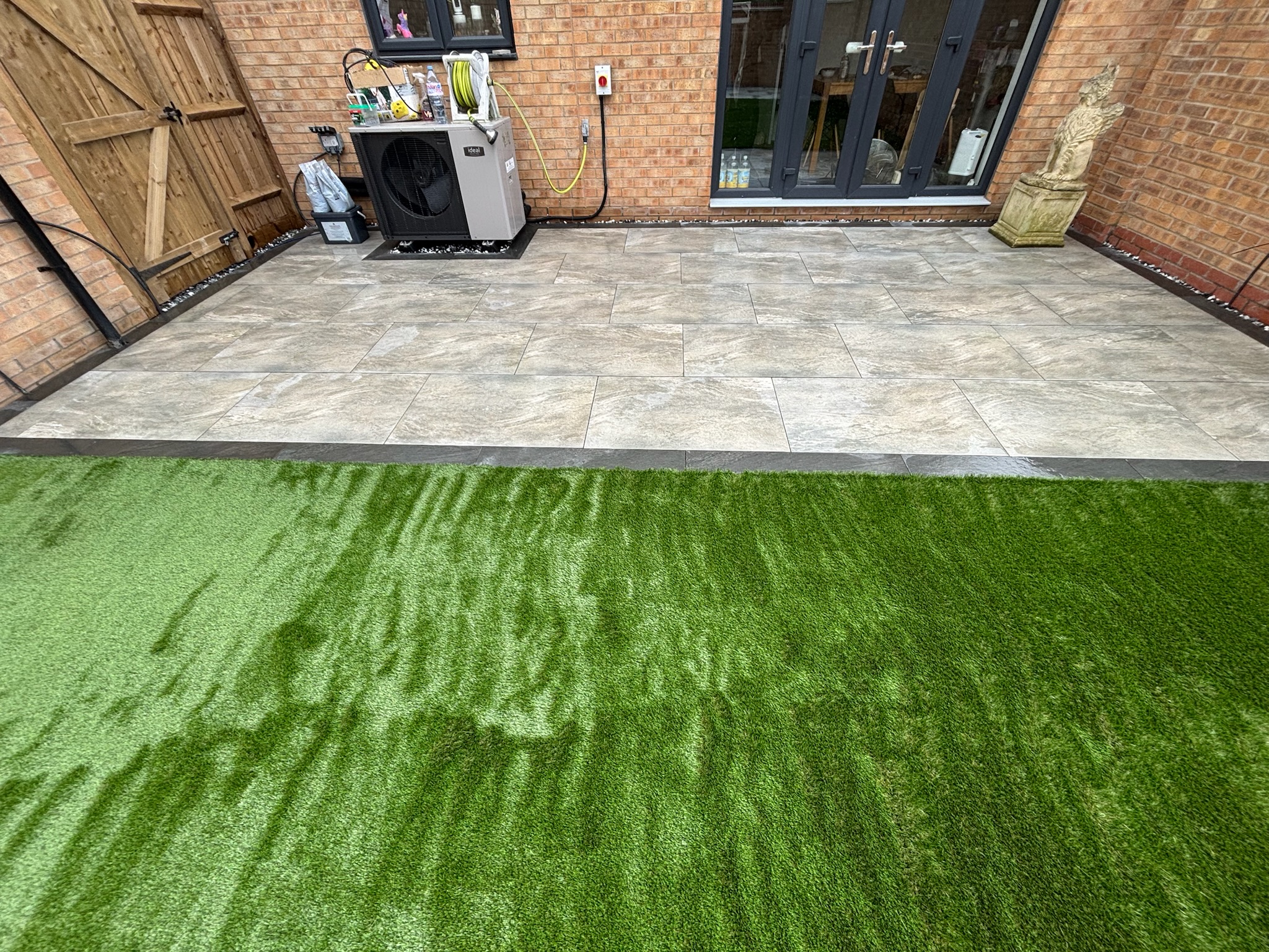 Earthcore Grey Porcelain Patios with Artificial Grass finished photo 5