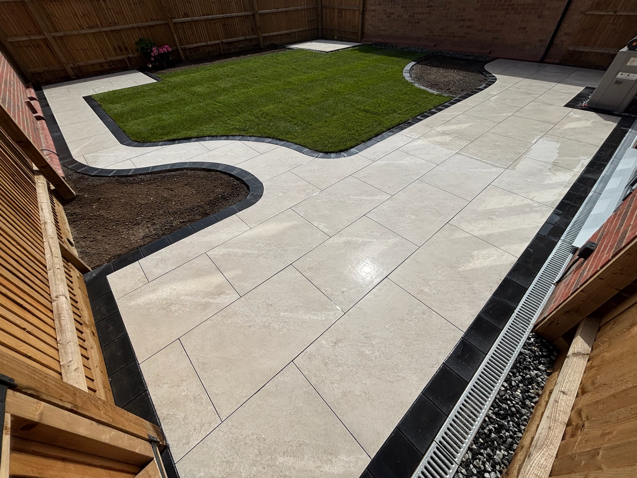 Himalayan Beige Porcelain Patio with Charcoal Border & Fresh Lawn