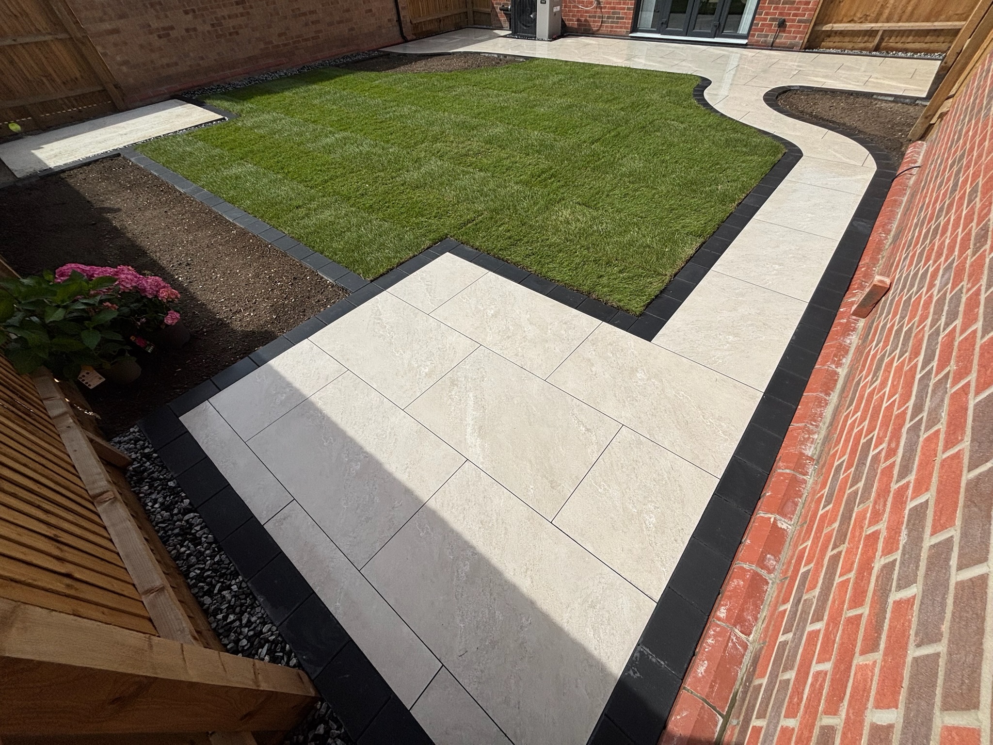 Himalayan Beige Porcelain Patio with Charcoal Border & Fresh Lawn