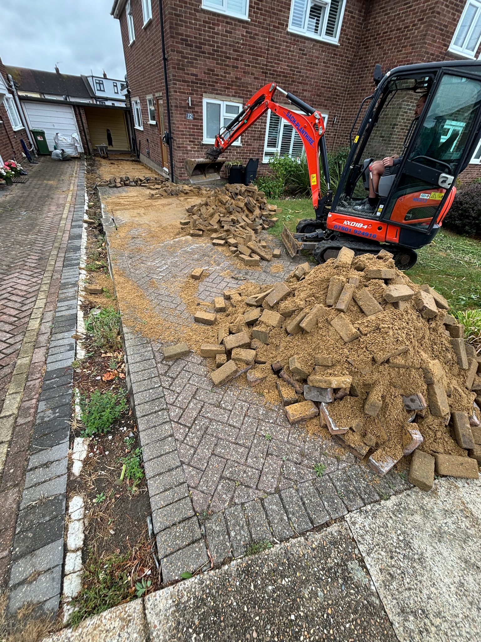 Castlepave Smooth Driveway with Fencing before photo 2