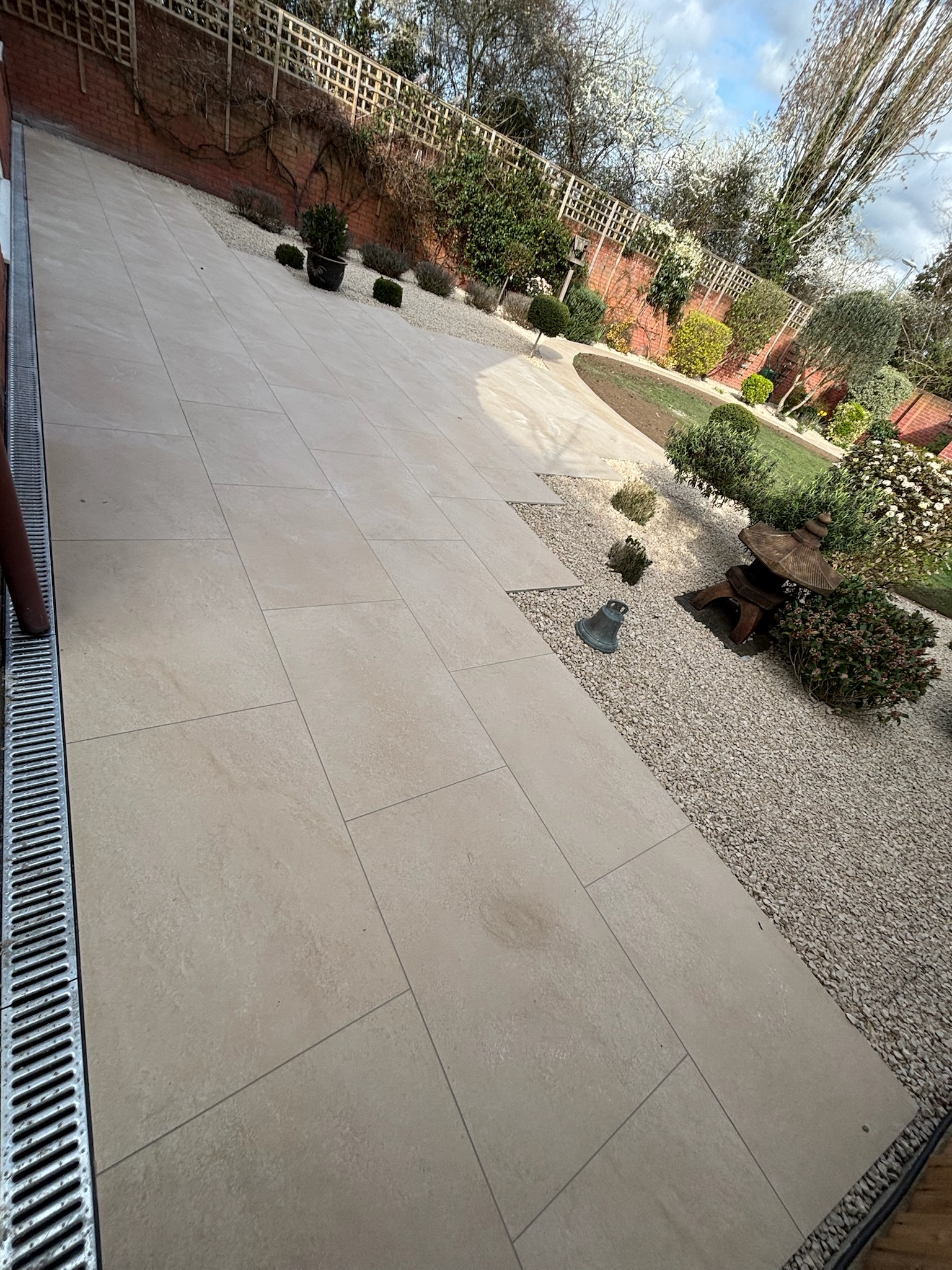 Castle Beige Porcelain Patio & Pathway with Cotswold Stone Beds finished photo 2