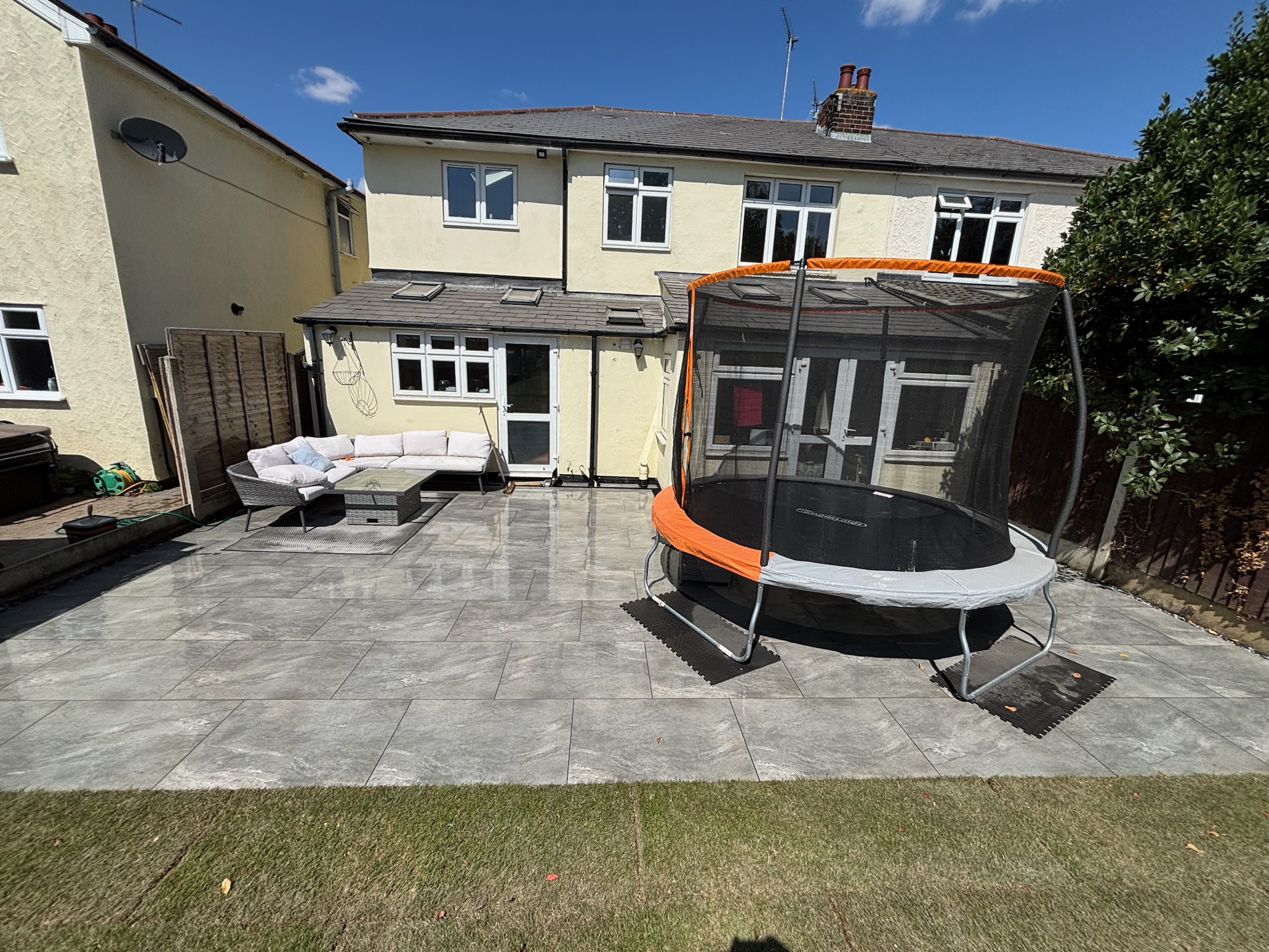 Mercury Porcelain Patio with Raised Sleeper Planters & Natural Turf