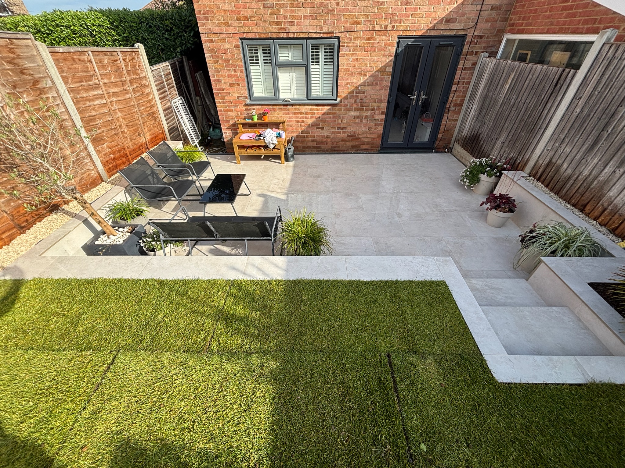 Merlot Bone Slate Effect Porcelain Patio with Retaining Wall & Steps finished photo 5
